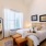 bedroom with large windows whisper valley