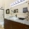 bathroom with tub and mirrors