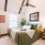 bedroom with large windows whisper valley